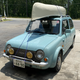 Image for article titled A Nissan Pao Makes A Perfectly Capable Canoe Hauler In Case You Were Curious
